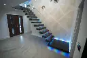 Luminous Ascent Floating Staircases with Integrated LED & Glass7.webp