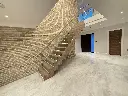 Closed tread staircase design with led lights (4).webp